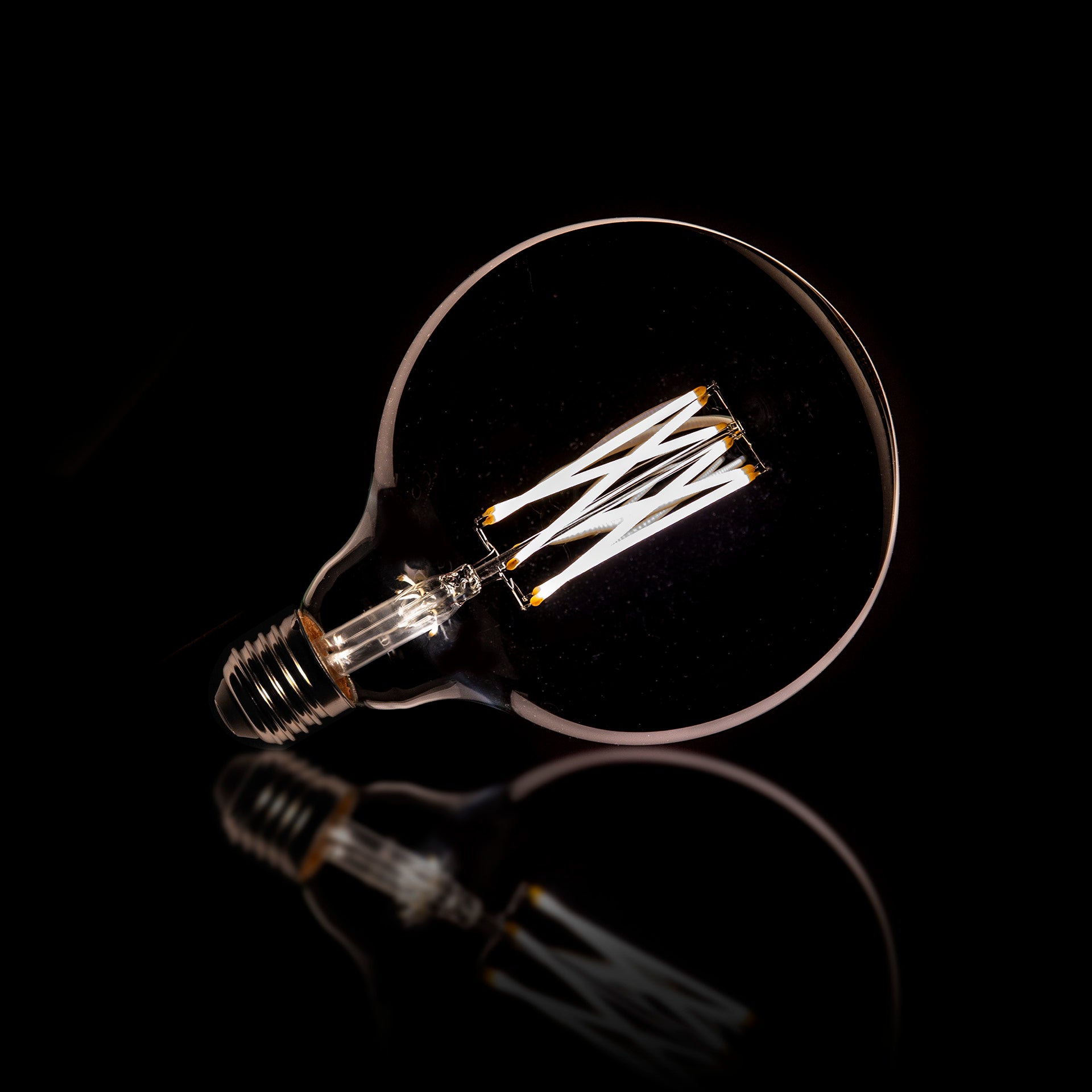 LED Filament Globus G125 Ø12,5 cm E27 – dimmbar in Amber & Rauchgrau, 6W, 2100K/2700K, 450/270 lm